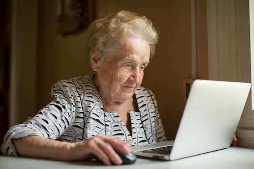 older person using computer